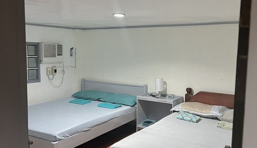 Habitación Signature con 2 camas individuales