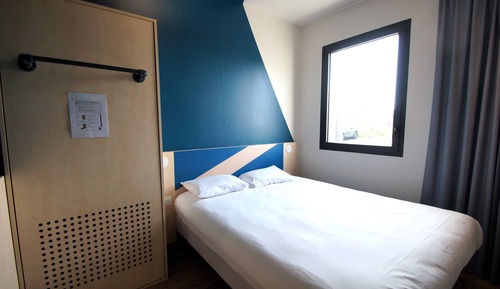 Habitación triple, varias camas