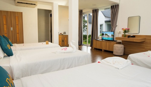Habitación Deluxe doble, 2 camas de matrimonio, vistas al jardín
