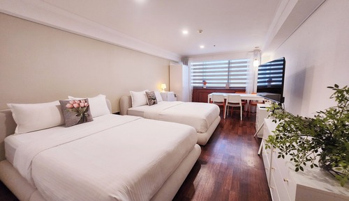 Habitación familiar con 2 camas individuales