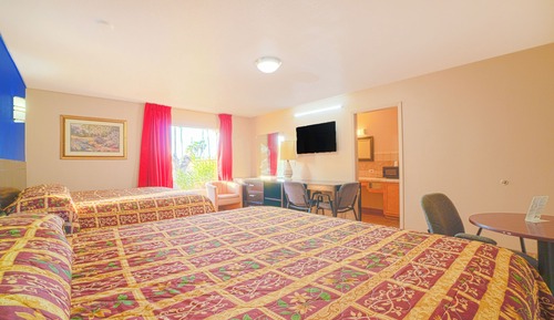 Habitación, varias camas