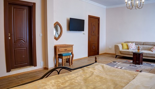 Habitación familiar, varias camas, vistas al patio, en la zona del jardín