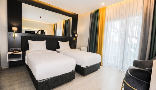 Habitación superior con 1 cama doble o 2 individuales