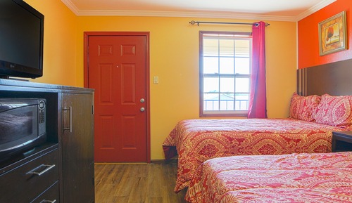 Habitación, varias camas