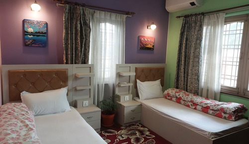 Habitación clásica con 2 camas individuales