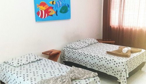 Habitación familiar, varias camas