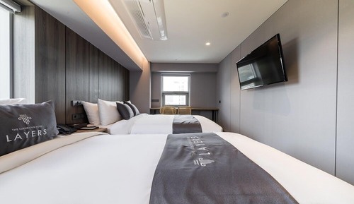 Habitación cuádruple Deluxe, 2 camas dobles