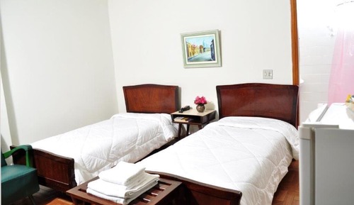 Habitación con 2 camas individuales