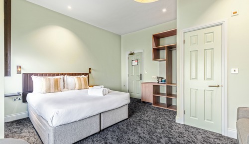 Habitación Deluxe doble, 1 cama doble con sofá cama