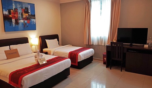Habitación triple Deluxe (with A/C)