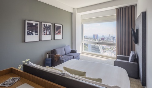 Habitación Deluxe, 1 cama de matrimonio grande, vistas a la ciudad