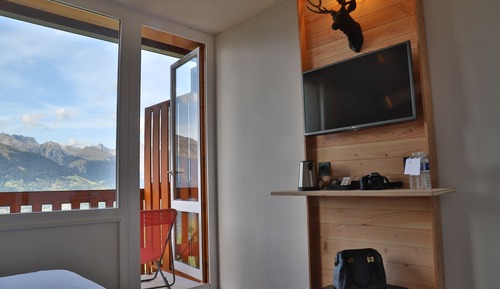 Habitación triple superior, balcón