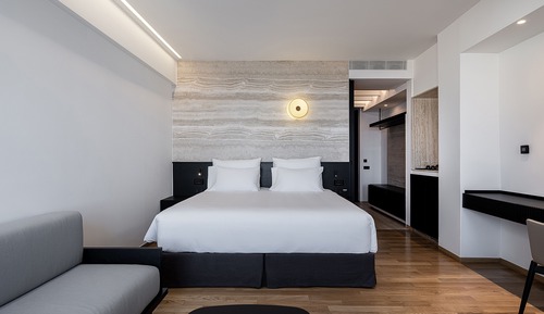 Habitación junior con 1 cama doble o 2 individuales, vistas al mar