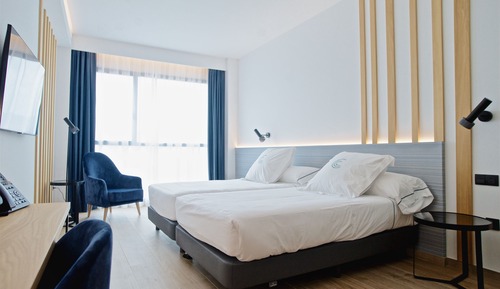 Habitación estándar con 1 cama doble o 2 individuales