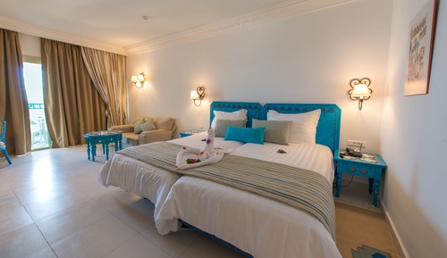 Habitación triple, vistas al mar