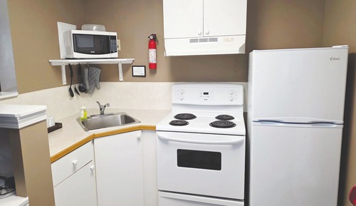 Suite estudio Signature, 1 cama de matrimonio grande, cocina básica, planta baja