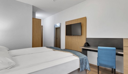 Habitación estándar con 1 cama doble o 2 individuales