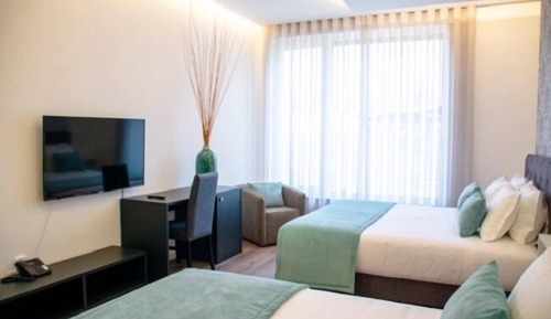Habitación cuádruple Deluxe