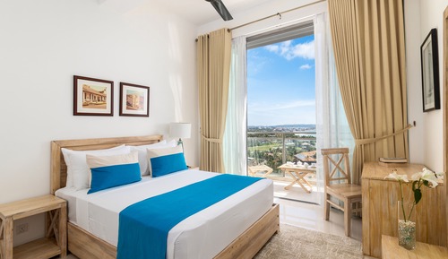Apartamento Deluxe, cocina, vistas parciales al mar