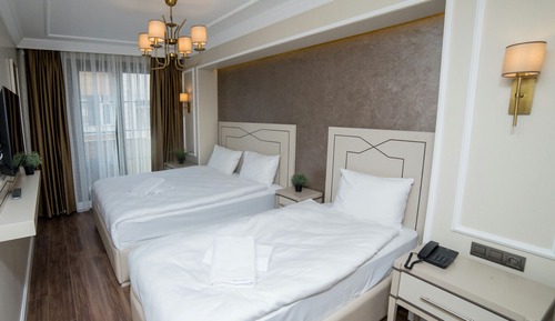 Habitación triple Deluxe