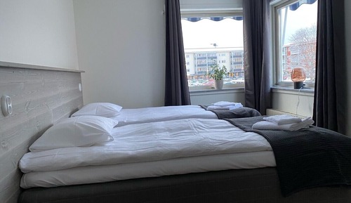 Habitación estándar con 1 cama doble o 2 individuales