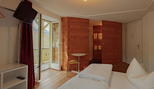 Habitación Confort con 1 cama doble o 2 individuales