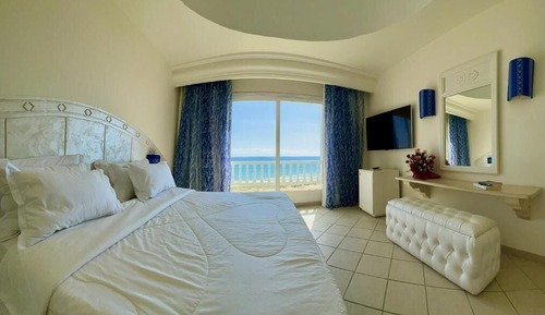 Suite básica, 1 cama de matrimonio grande, vistas al mar