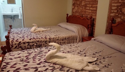 Habitación cuádruple Deluxe