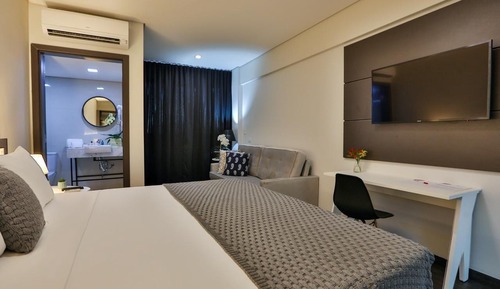 Habitación Deluxe doble, 1 cama de matrimonio grande, Aire acondicionado