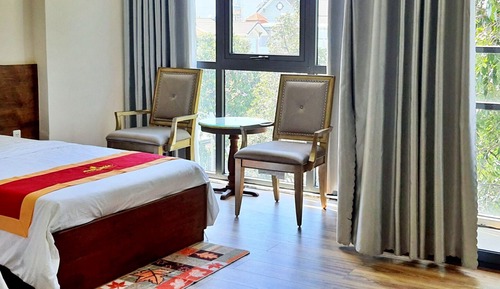 Habitación Deluxe con 2 camas individuales, 2 camas dobles, vistas a la ciudad