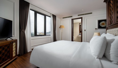 Habitación junior con 1 cama doble o 2 individuales, vistas a la ciudad (Suite)