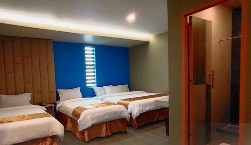 Habitación cuádruple Deluxe