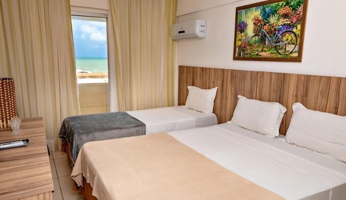 Habitación superior, vistas a la playa