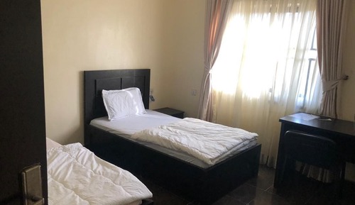 Habitación con 2 camas individuales