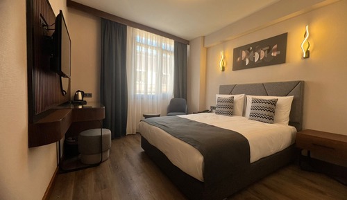Habitación superior con 1 cama doble o 2 individuales