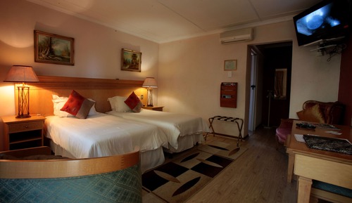 Habitación de lujo con 1 cama doble o 2 individuales