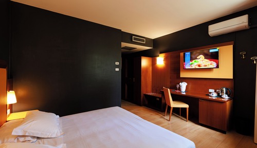Habitación estándar con 1 cama doble o 2 individuales