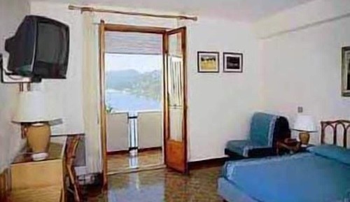 Habitación triple, vistas al mar