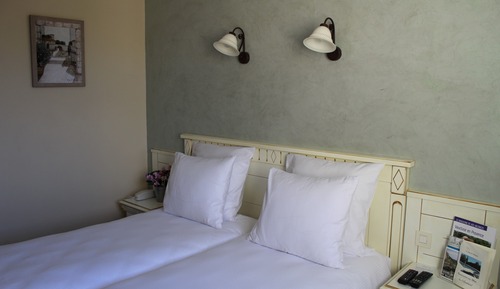 Habitación estándar con 1 cama doble o 2 individuales