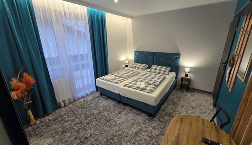 Habitación Deluxe con 1 cama doble o 2 individuales