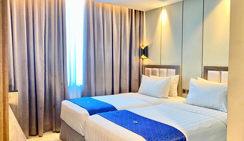 Habitación superior con 1 cama doble o 2 individuales