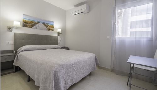 Atico dos dormitorios con terraza y litera