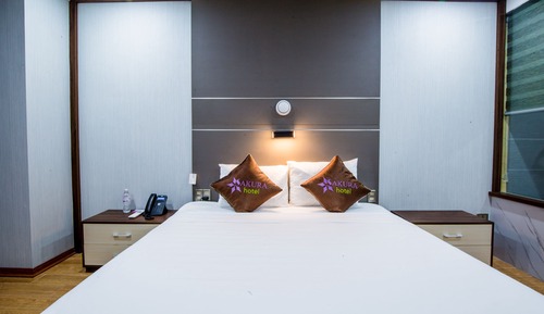 Habitación triple Deluxe