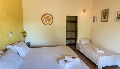 Habitación triple familiar, lanai, vistas al jardín