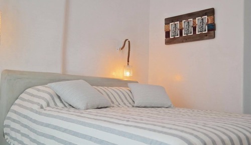 Apartamento superior, planta baja