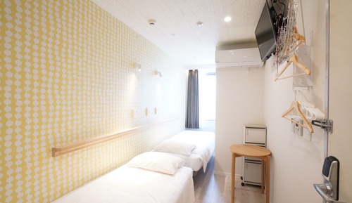 Habitación con 2 camas individuales