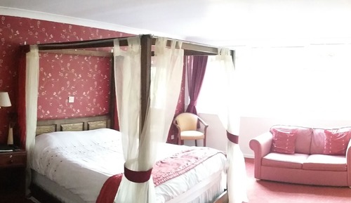 Habitación superior (Four Poster)