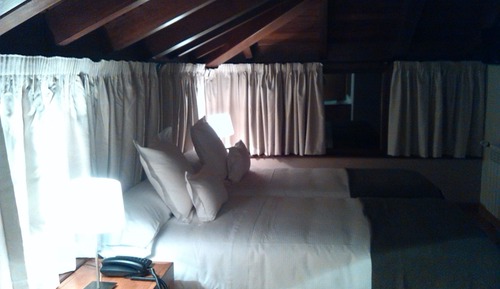 Habitación superior con 1 cama doble o 2 individuales