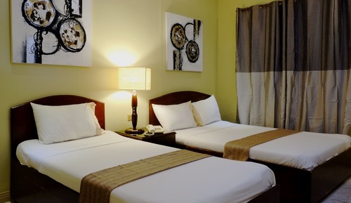 Habitación Deluxe, varias camas