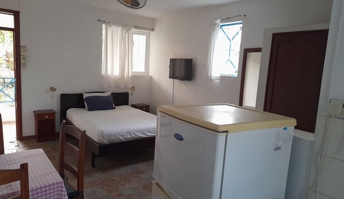 Estudio económico, dormitorio mixto